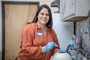 Instructor holding a collected sample