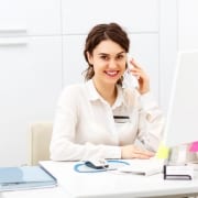 A Billing and Coding Specialist at her desk
