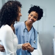 Healthcare worker assisting a patient