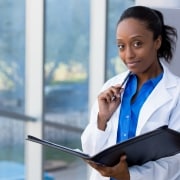 Hospital manager with paperwork