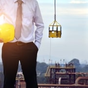 Inspector with a hard hat