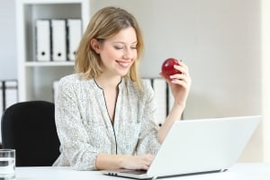 Healthy businesswoman at a desk