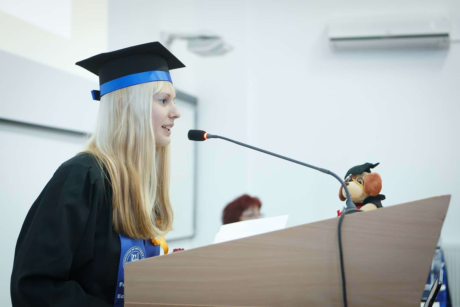 Female graduate at a podium