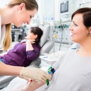 Healthcare professional performing a blood transfusion