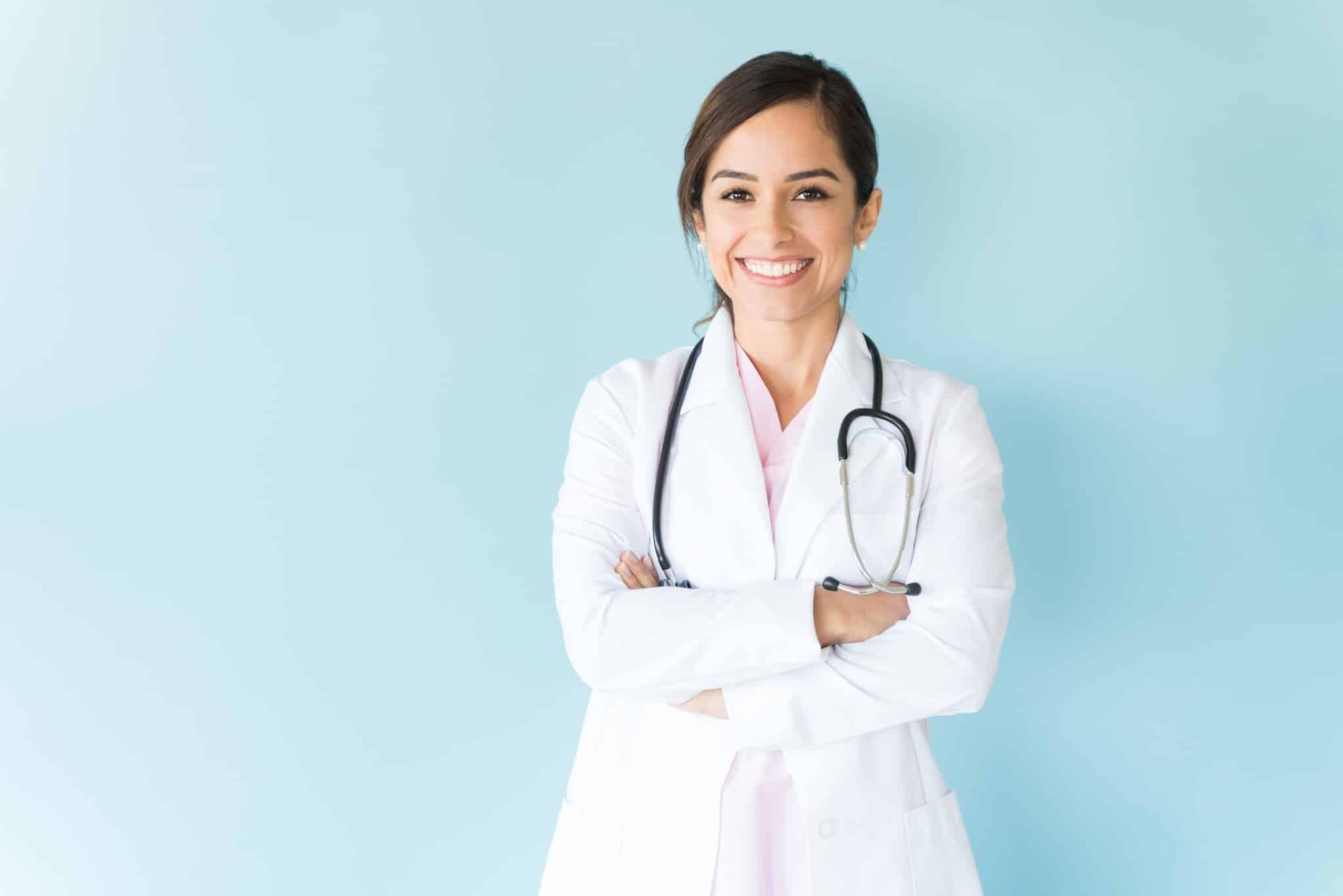 Smiling medical professional with arms crossed