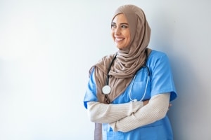 Smiling nurse wearing a hijab