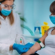 Medical professional taking a blood sample