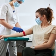 Phlebotomy Technician drawing blood