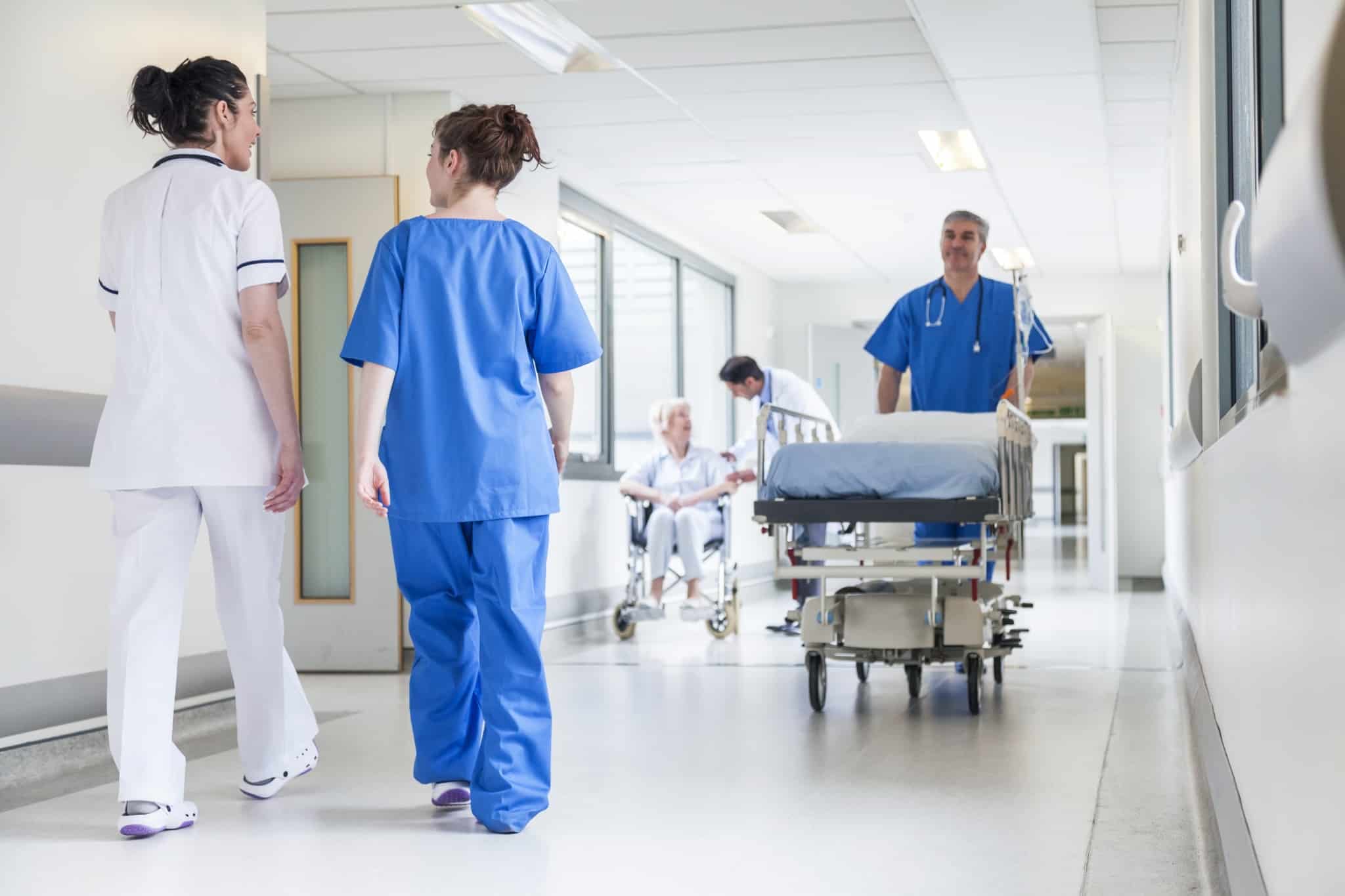 Nurse pushing a stretcher in a hospital