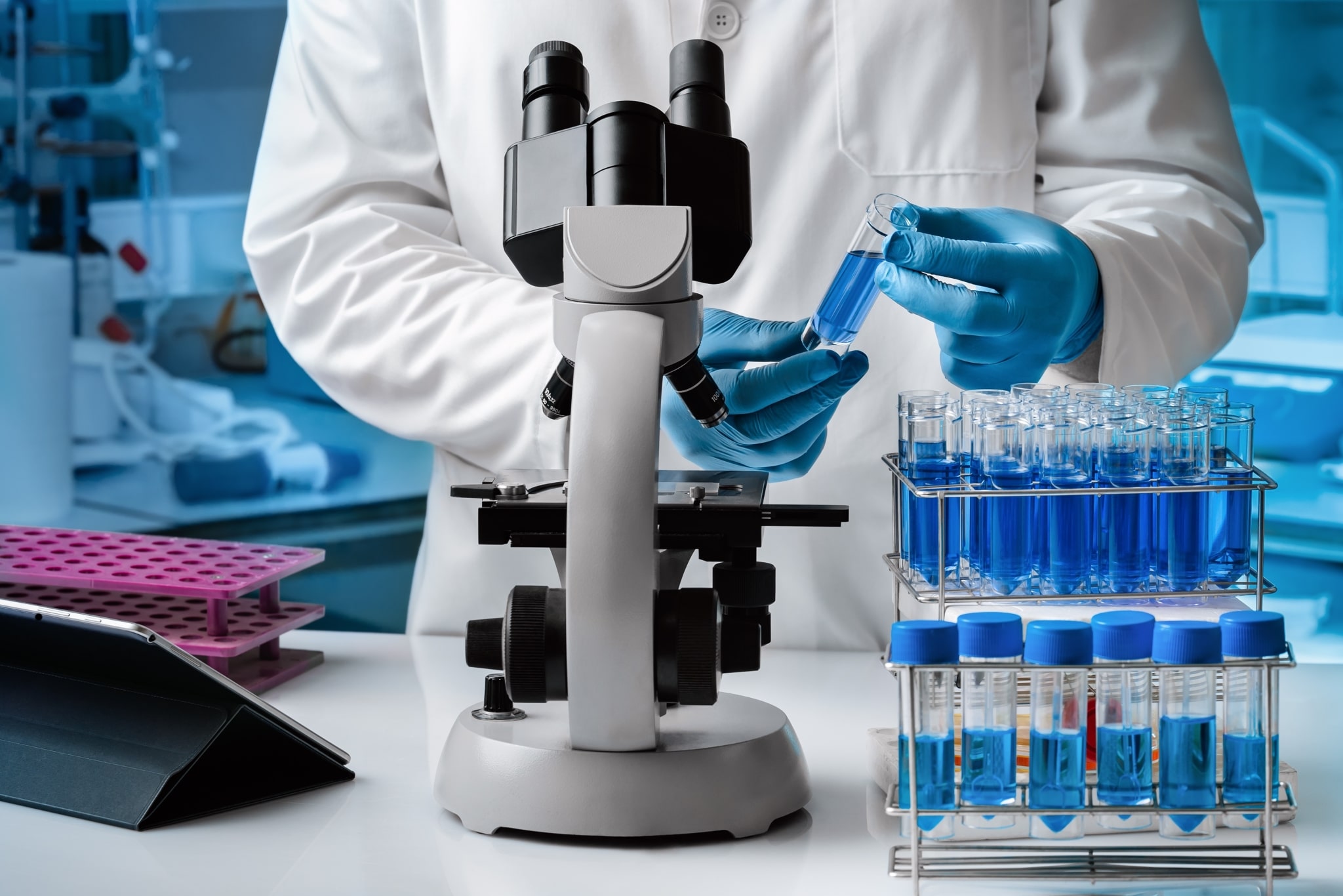 Scientist examining test samples