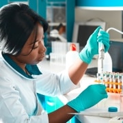 African scientist performs tests in a lab