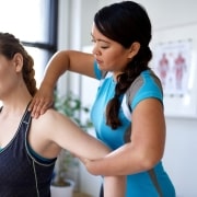 Physical Therapist Assistant with a patient