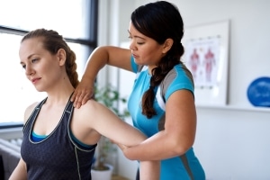 Physical Therapist Assistant with a patient