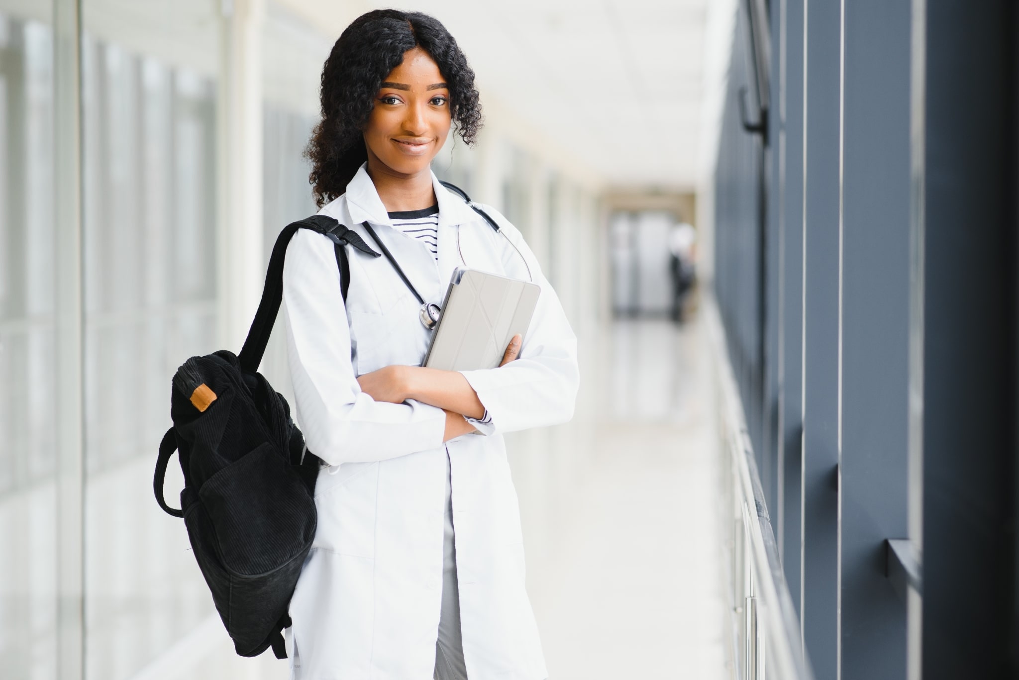 African-American medical student in a hallway