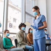 Nurse with diverse group of people