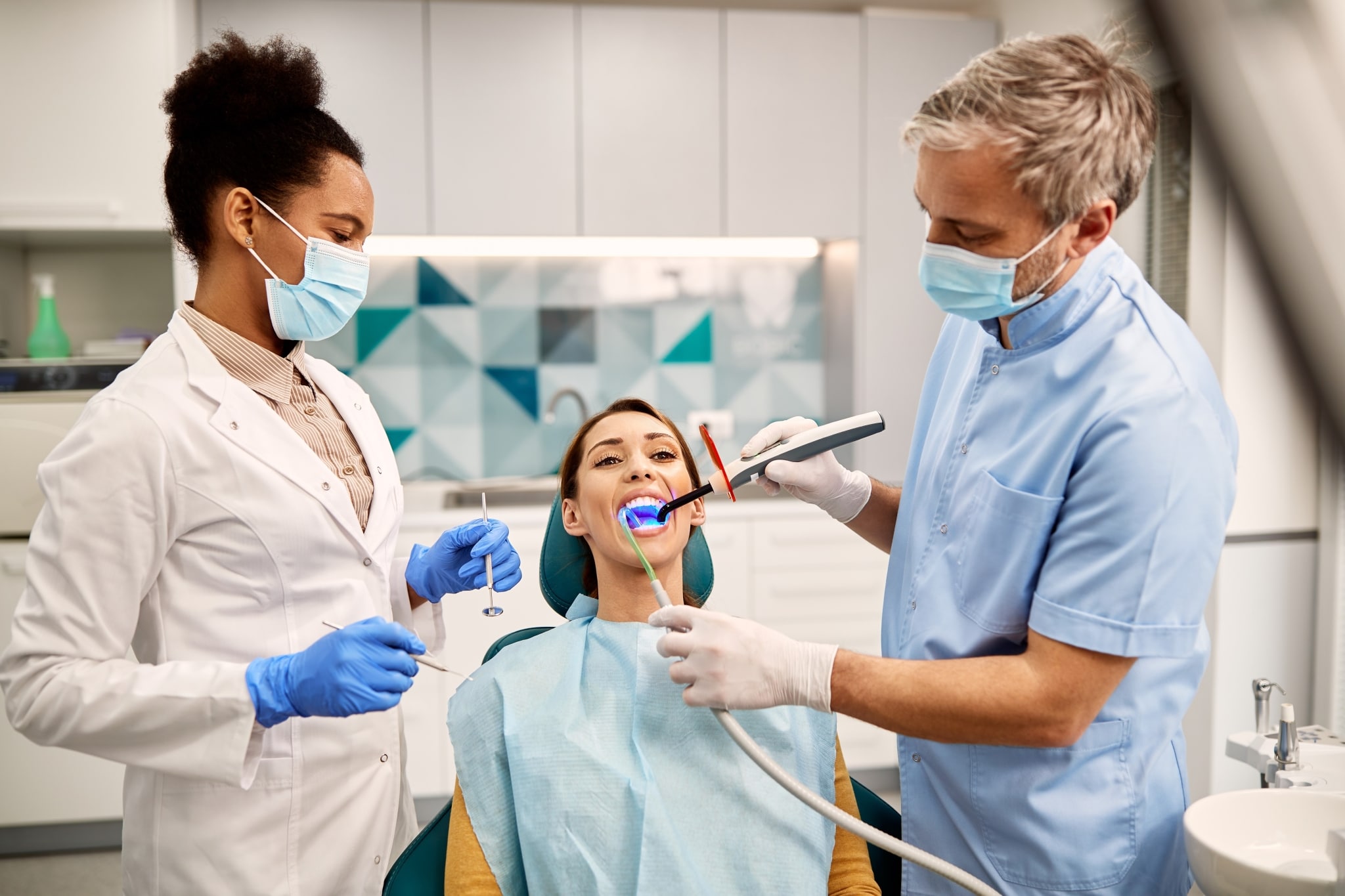 Dental team treating a patient