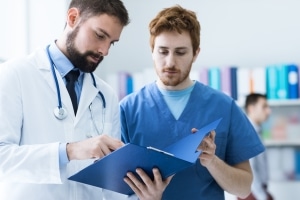 Medical team checking paperwork