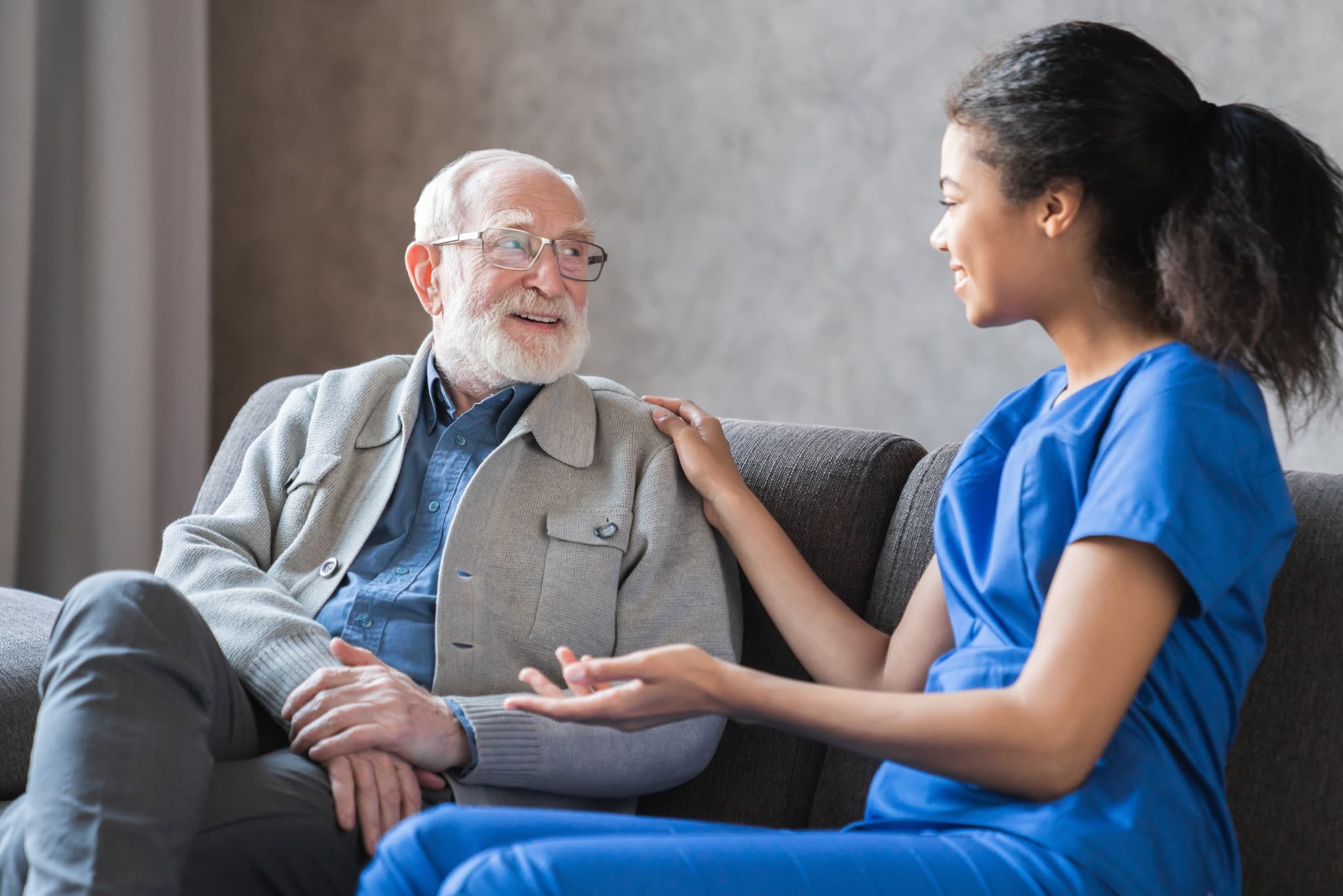 African-American medical professional with elderly patient