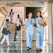 Nursing students walking in a hallway