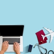 Aerial view of a Travel Nurse using a laptop