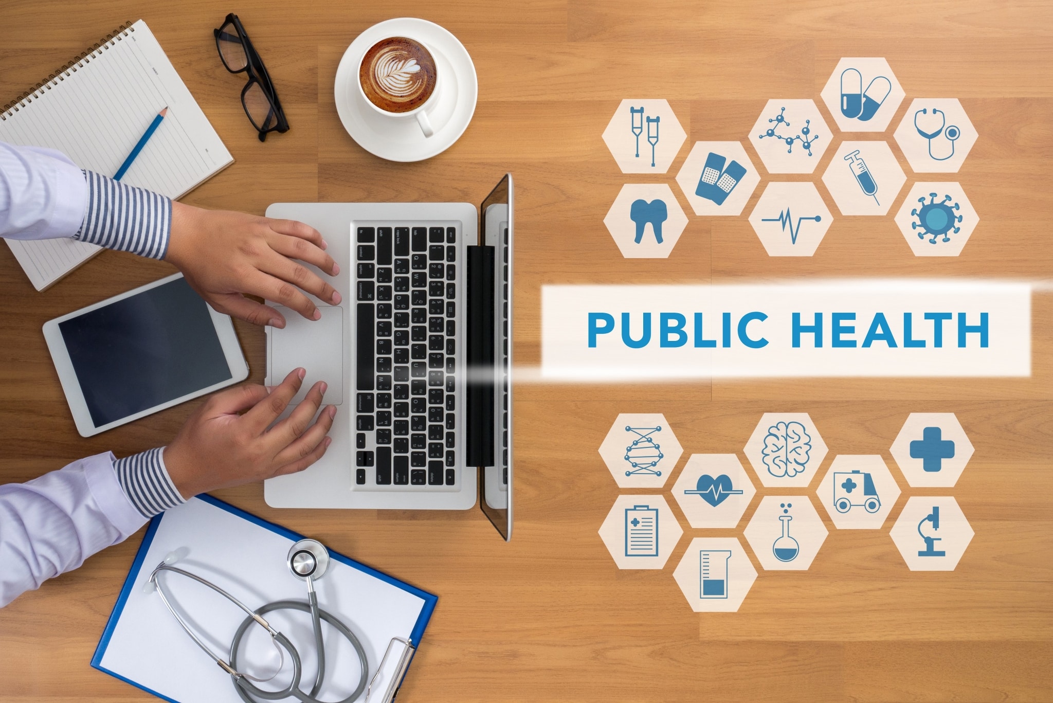 Overhead view of healthcare symbols and letters that say public health