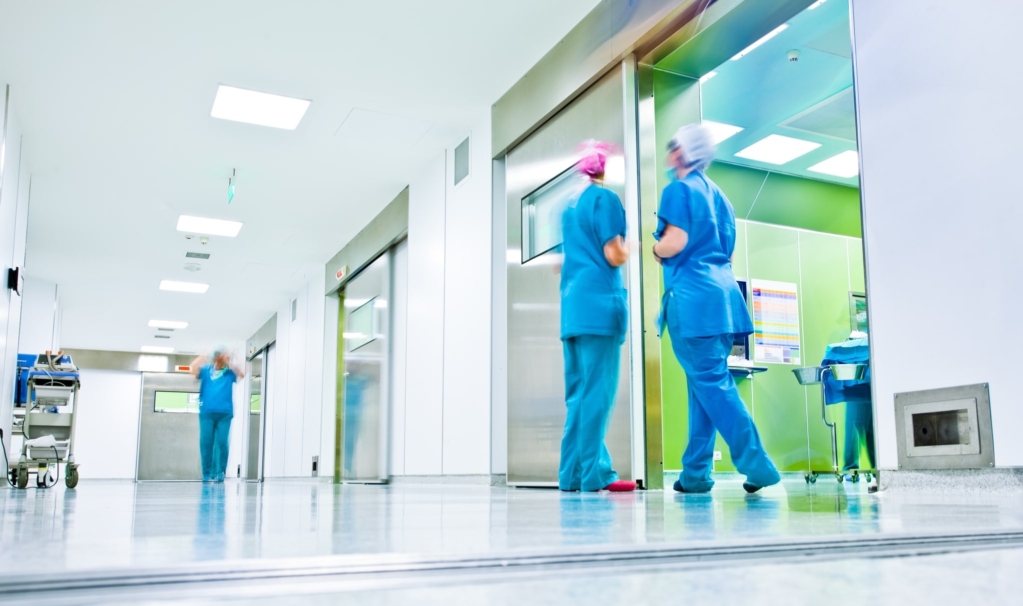Nurses standing in a hospital hallway