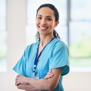 Confident female medical professional with her arms crossed