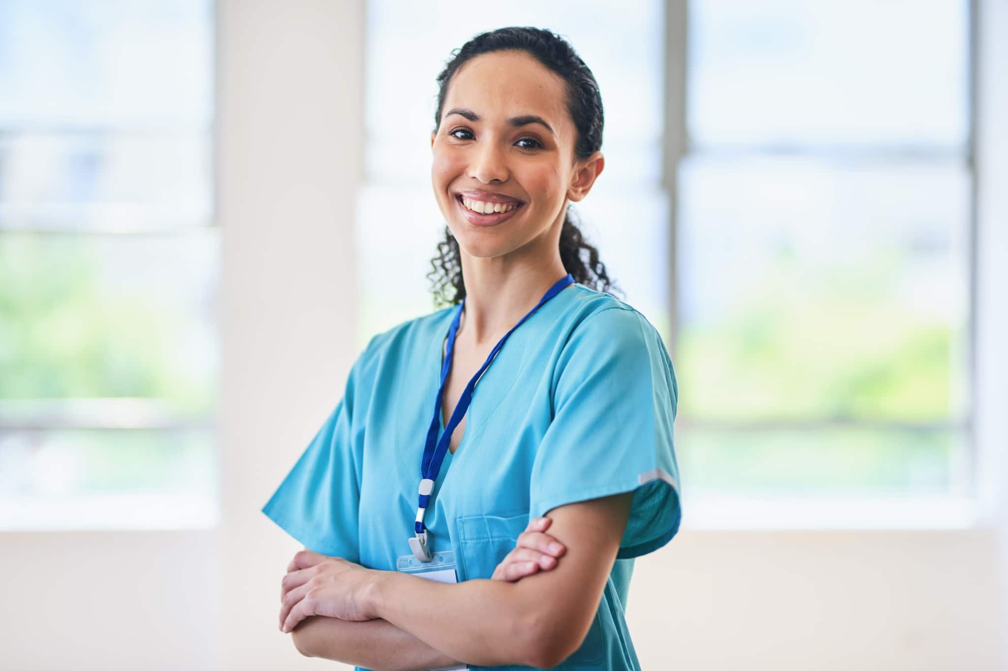 Confident female medical professional with her arms crossed