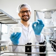 Male Sterile Processing Technician in a lab