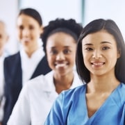 Diverse team of medical professionals standing in a line