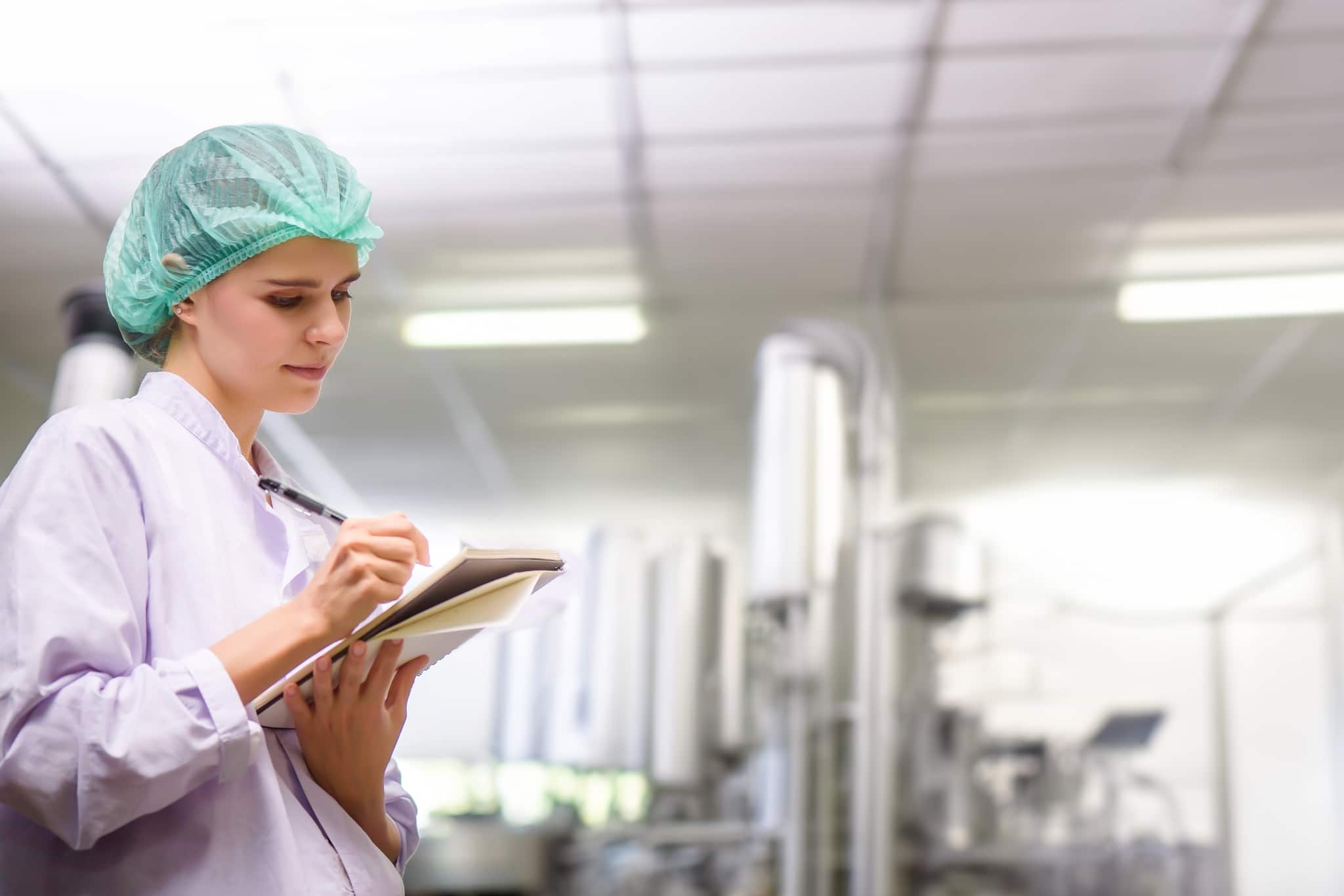 Sterile processing technician taking notes