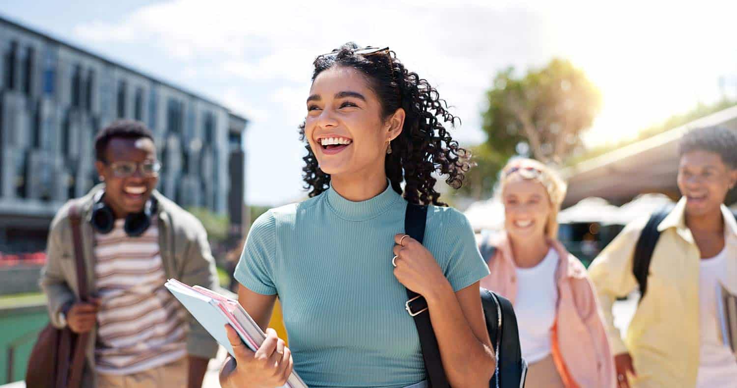 Diverse group of students walking outside