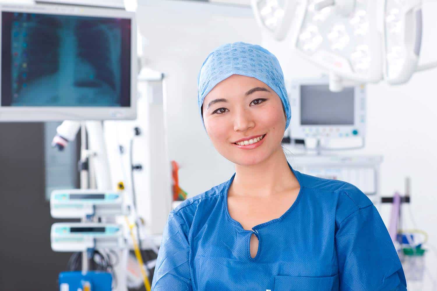 Close up of an Asian medical professional in scrubs